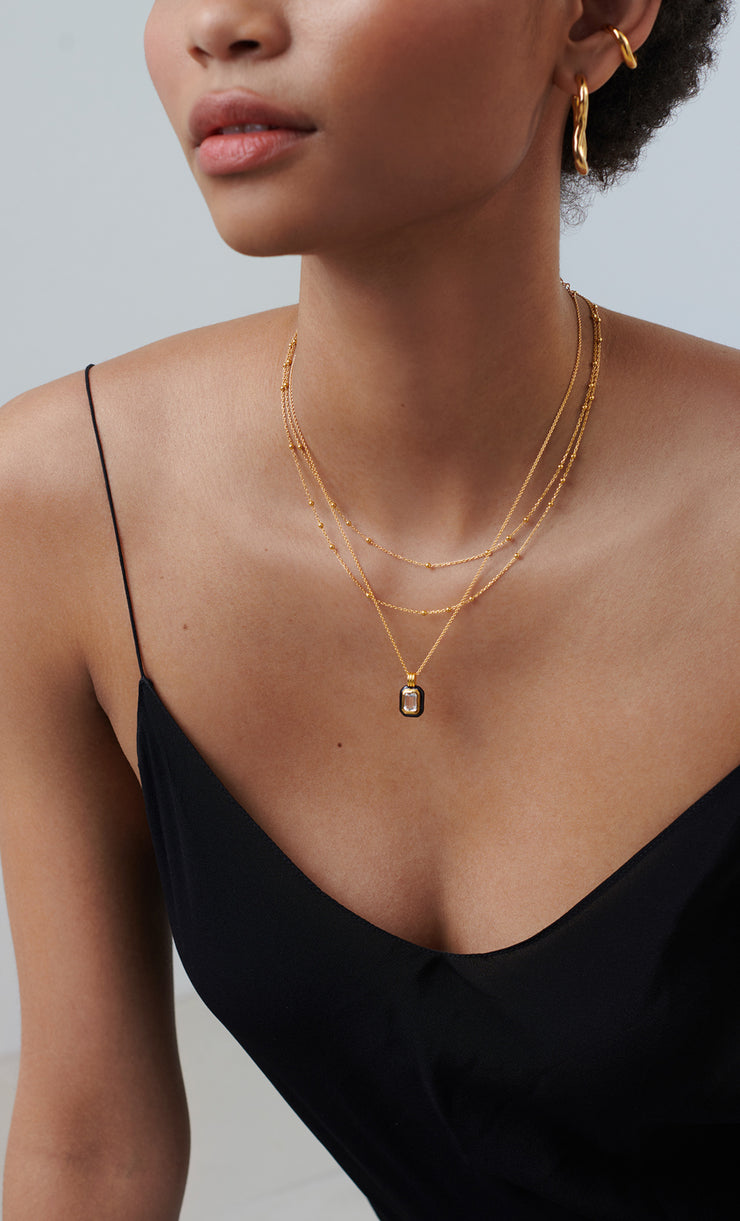 BLACK STONE & ENAMEL PENDANT NECKLACE - GOLD