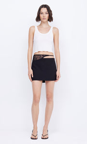 Black Laure Mini Skirt in Black with cutout by Bec + Bridge